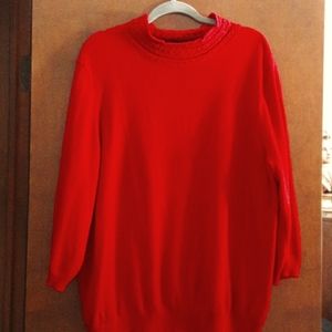 Very pretty sweater. Slight sparkle soft mock neck.